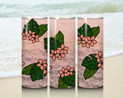 Three stainless steel tumblers with floral and leaf design on a beach background