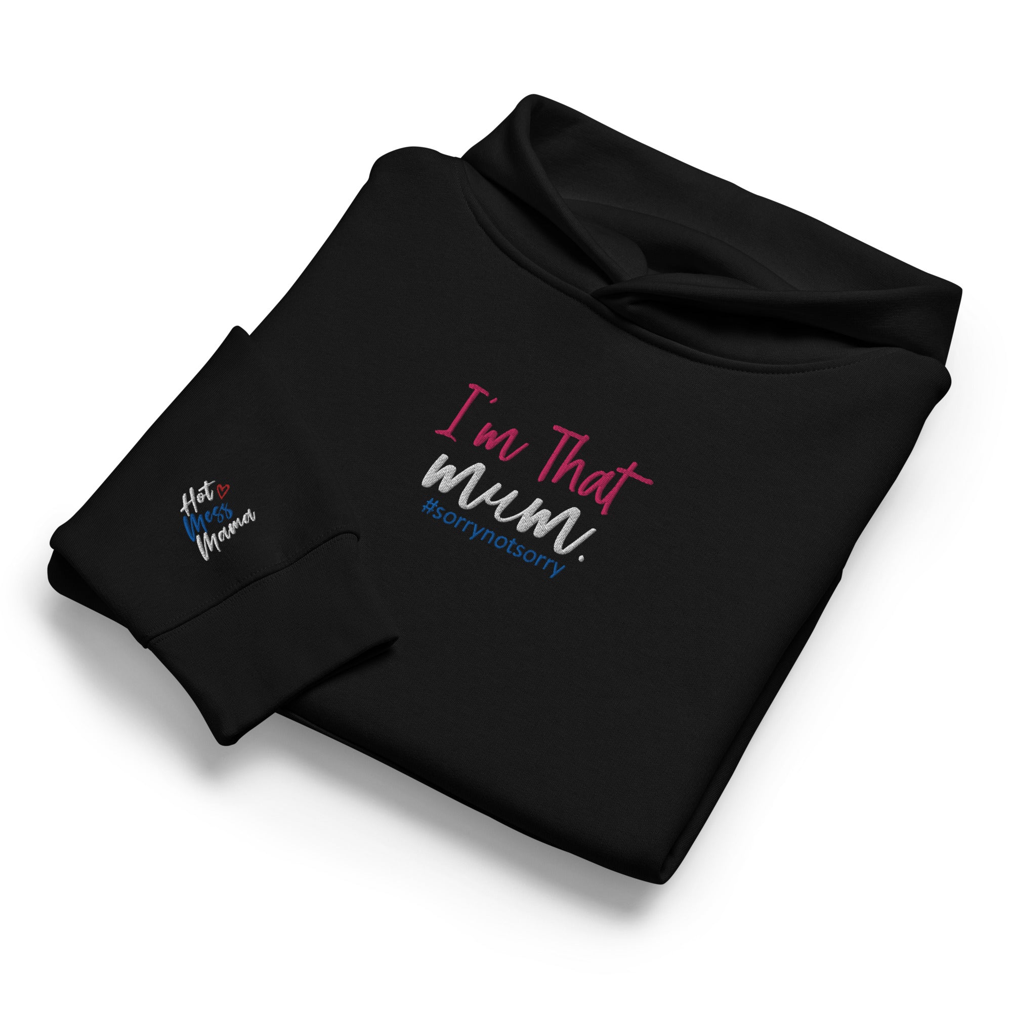 Folded black hoodie with 'I'm That Mum' text and embroidered sleeve on a white background