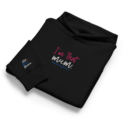 Folded black hoodie with 'I'm That Mum' text and embroidered sleeve on a white background