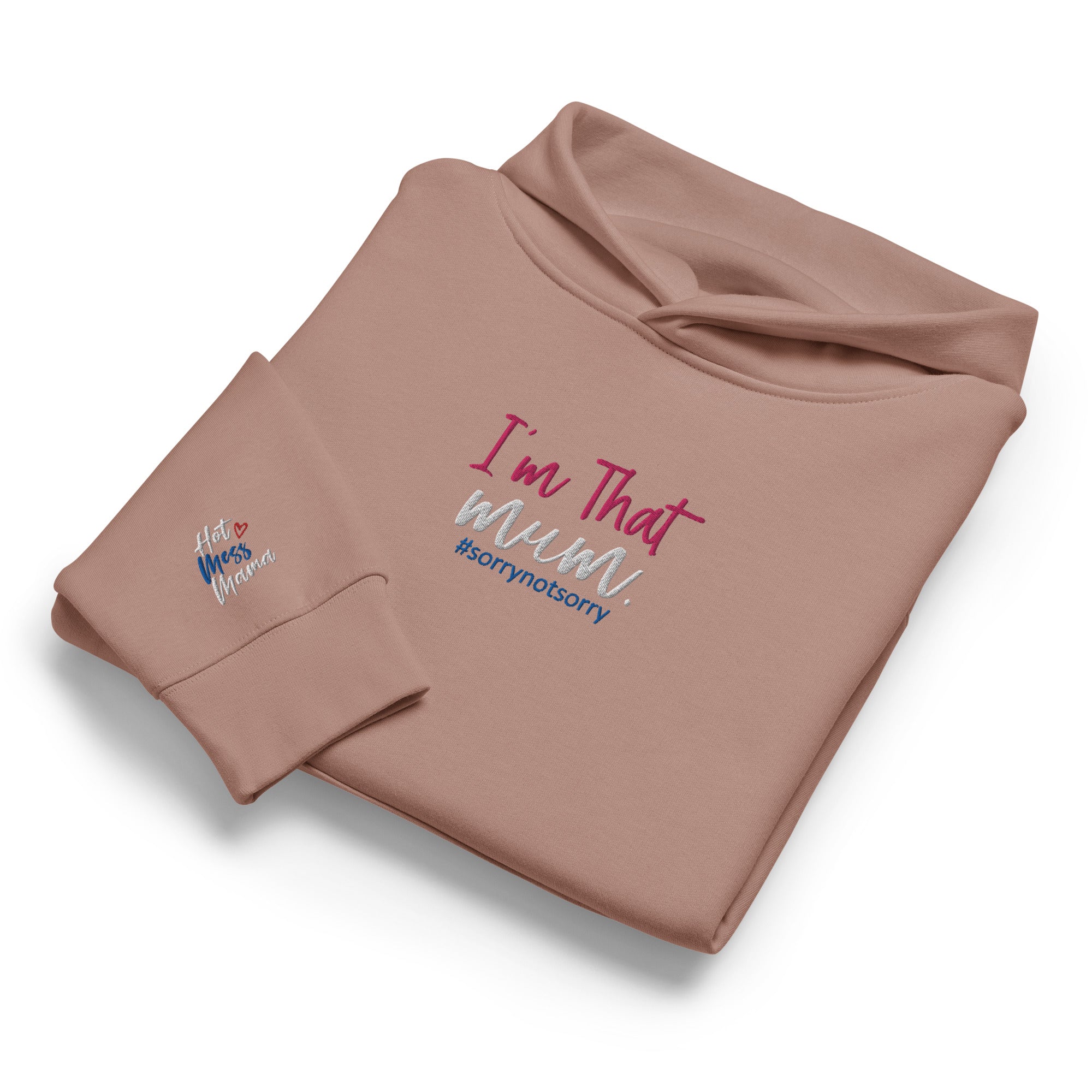 Folded brown sweatshirt with 'I'm That Mum' text and embroidered sleeve on a white background