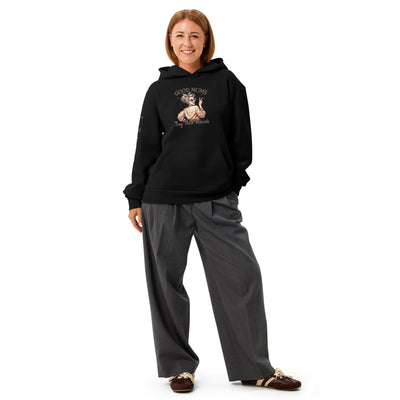 Person wearing a black hoodie with a graphic design on a white background
