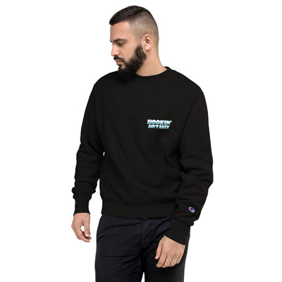 Man wearing a black sweatshirt with a logo on a white background