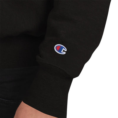 Close-up of a black sweatshirt sleeve with a logo on a white background