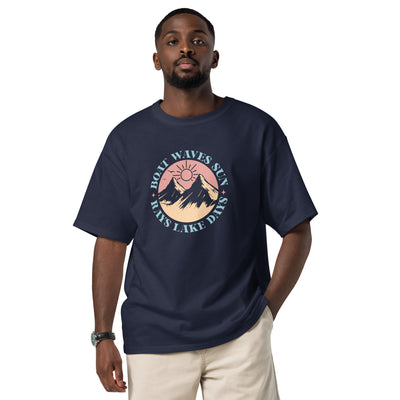 Man wearing a navy blue t-shirt with a graphic design on a white background