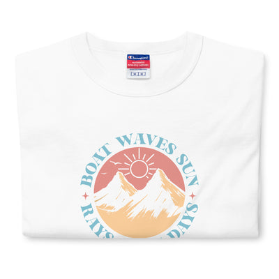 White t-shirt with a graphic design featuring mountains, sun, and text on a white background