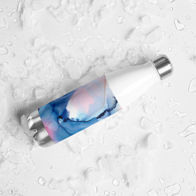 Marble-patterned bottle on a textured white background