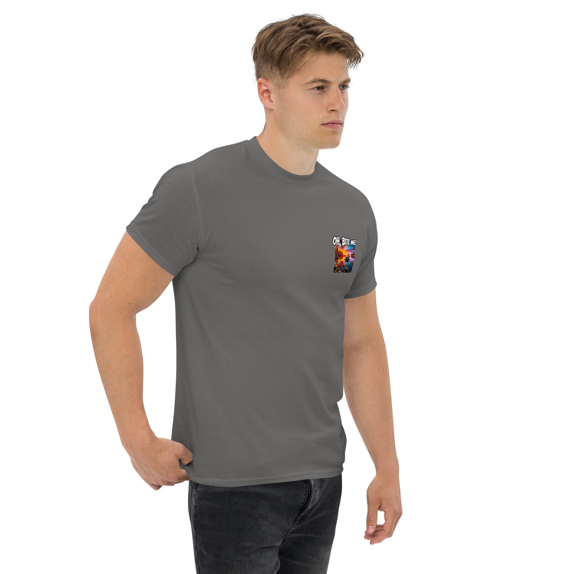Man wearing a grey t-shirt with a small fish logo on a white background