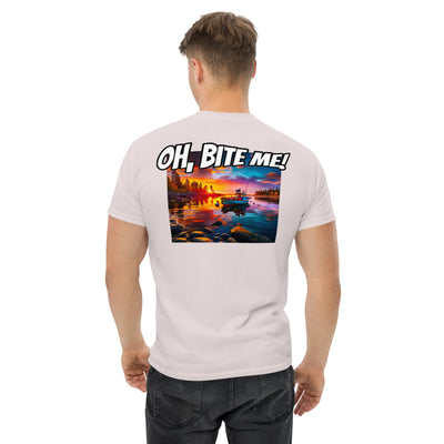 Man wearing a light grey t-shirt with a colourful scenic design and 'Oh Bite Me' text on the back