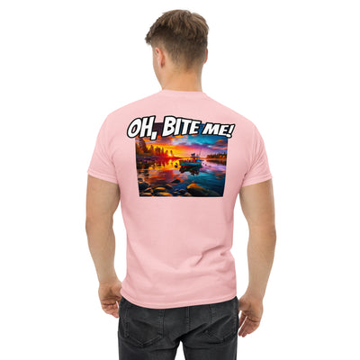 Man wearing a pink t-shirt with a sunset graphic and 'OH, BITE ME!' text on the back.