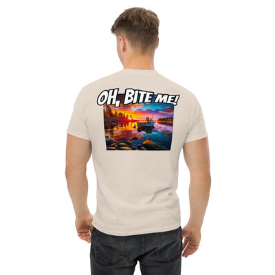 Man wearing a t-shirt with a scenic design and text on the back