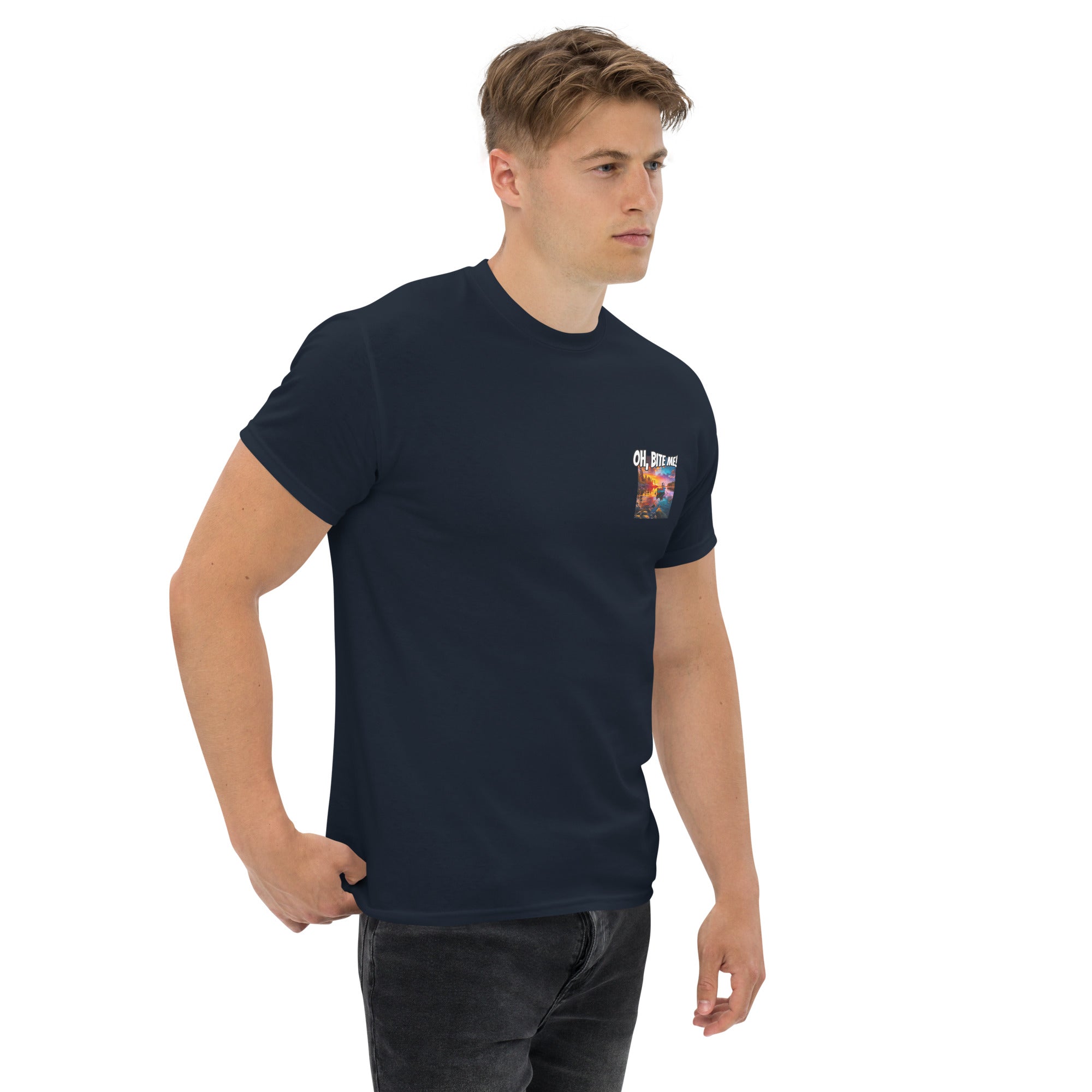 Man wearing a navy blue t-shirt with a logo on the chest against a white background