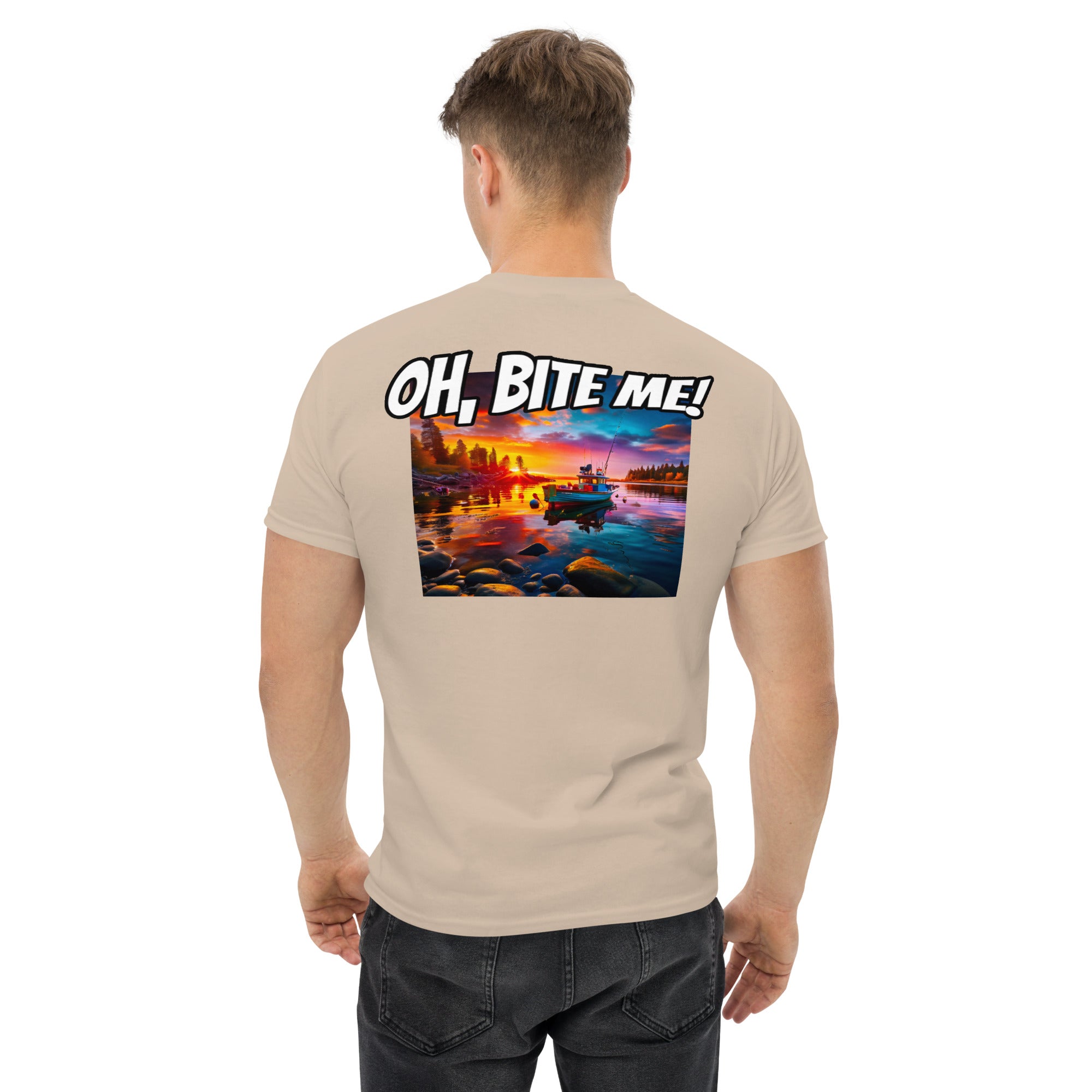 Man wearing a beige t-shirt with a colourful graphic and 'OH, BITE ME!' text on the back.