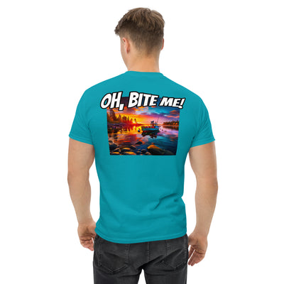 Person wearing a turquoise t-shirt with a sunset graphic and 'OH, BITE ME!' text on the back.