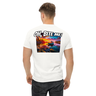 Person wearing a white t-shirt with a scenic print and text on the back