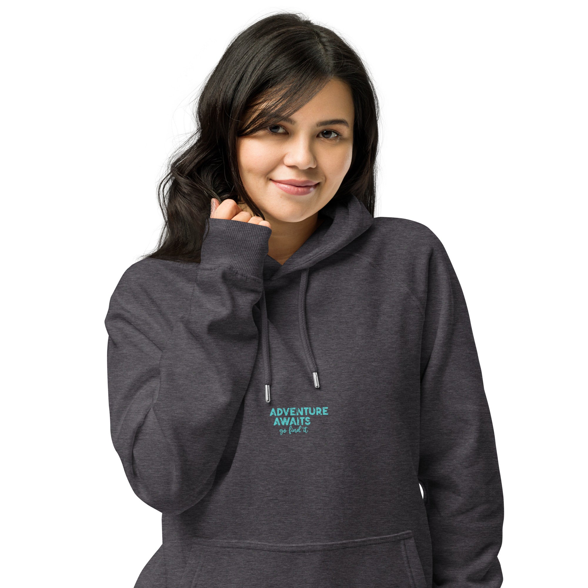 Woman wearing a dark gray hoodie with 'Adventure Awaits' text on a white background