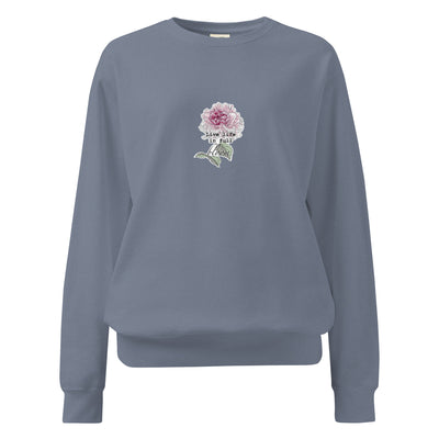 Gray sweatshirt with a floral design and text on a white background