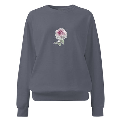 Gray sweatshirt with a floral design and text on a white background