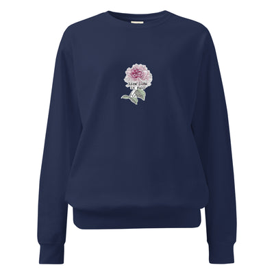Navy blue sweatshirt with a floral design on a white background