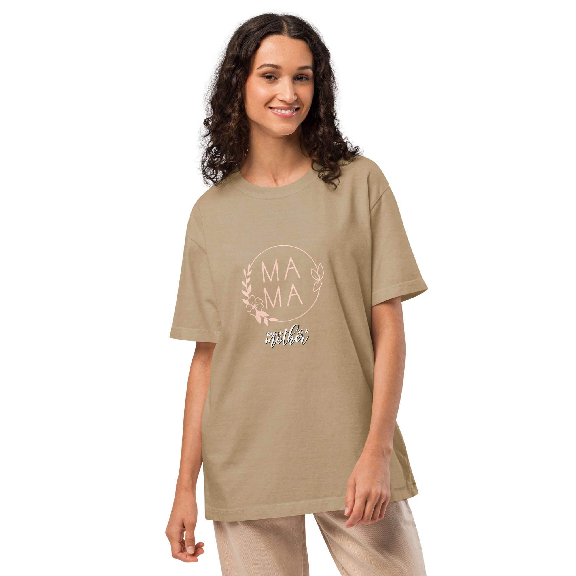 Woman wearing a khaki t-shirt with 'MAMA' text on a white background