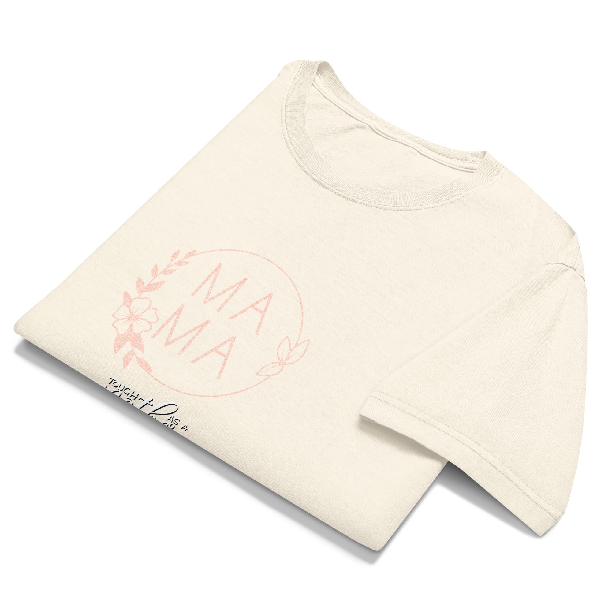 Folded vintage white t-shirt with 'MAMA' text on a white background