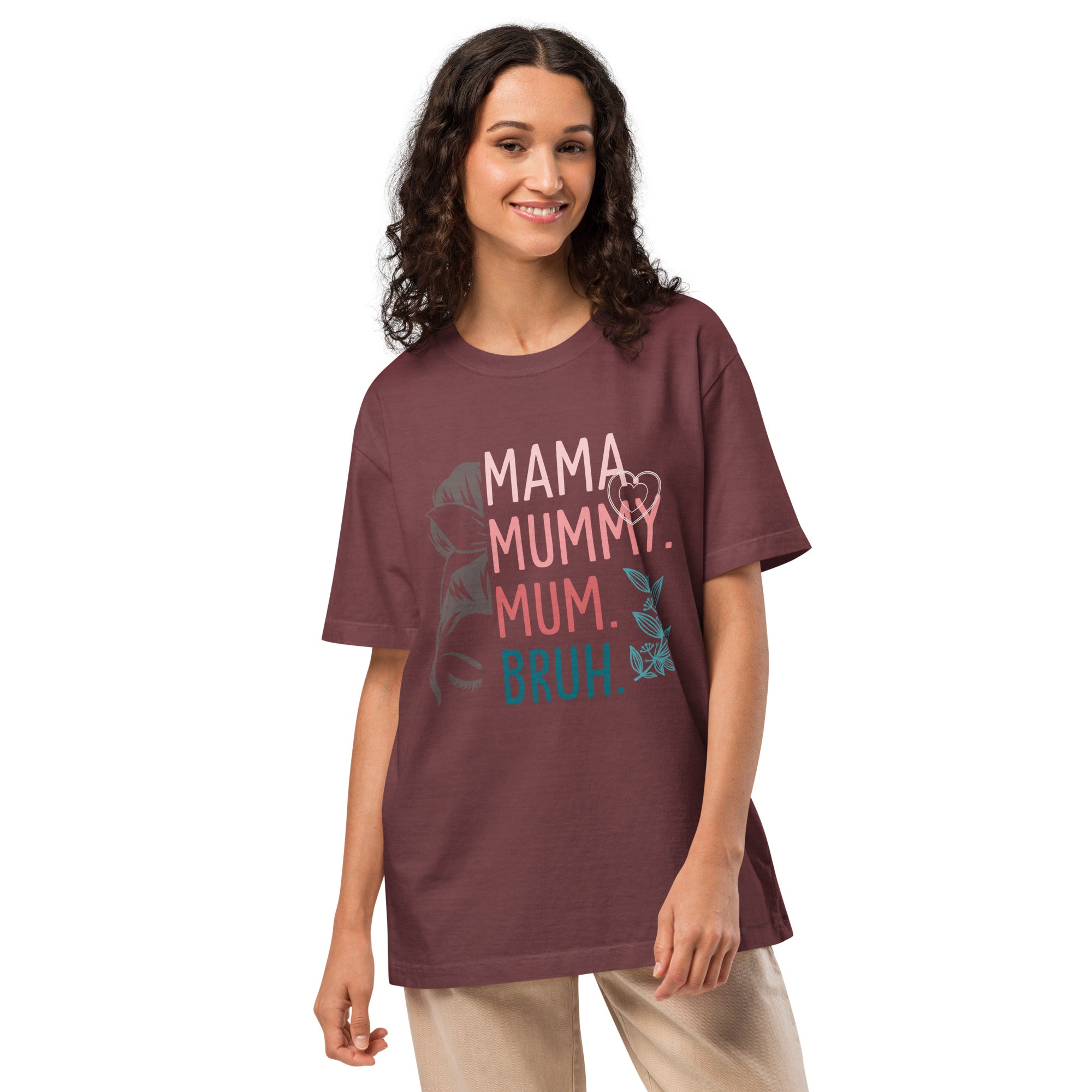 Woman wearing a maroon t-shirt with colourful text on a white background