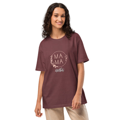 Woman wearing a maroon t-shirt with 'MAMA tough as a mother' text on a white background