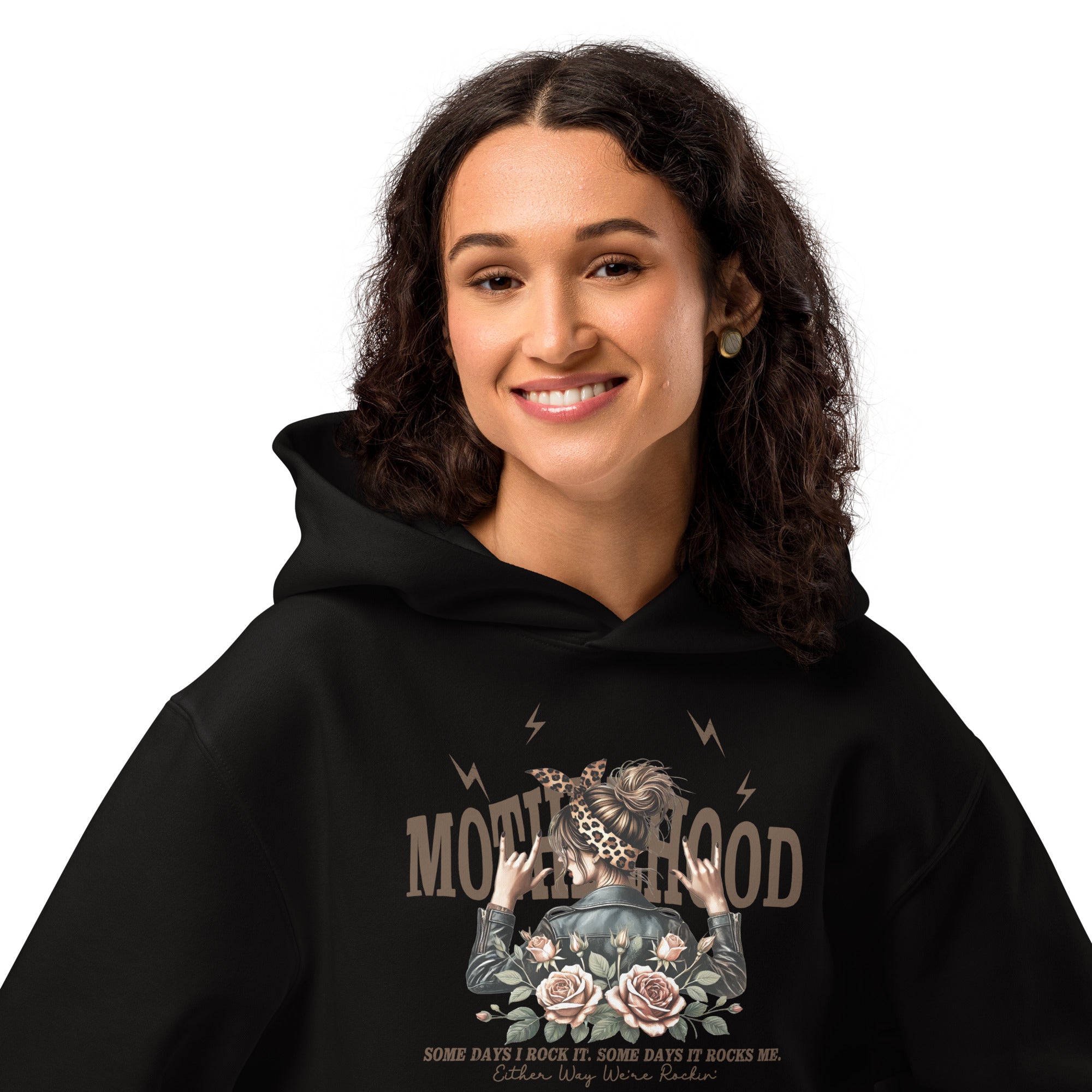 Person wearing a black hoodie with a graphic design on a white background