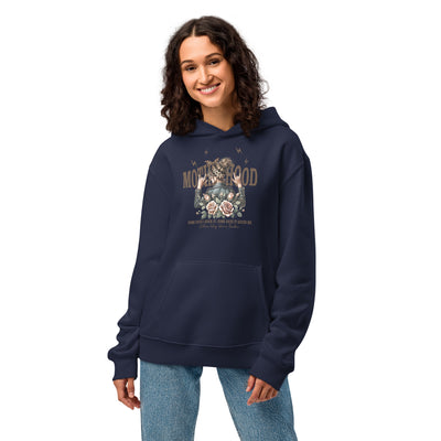 Woman wearing a navy blue hoodie with a graphic design on a white background