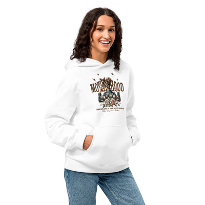 Woman wearing a white hoodie with a graphic design on a white background