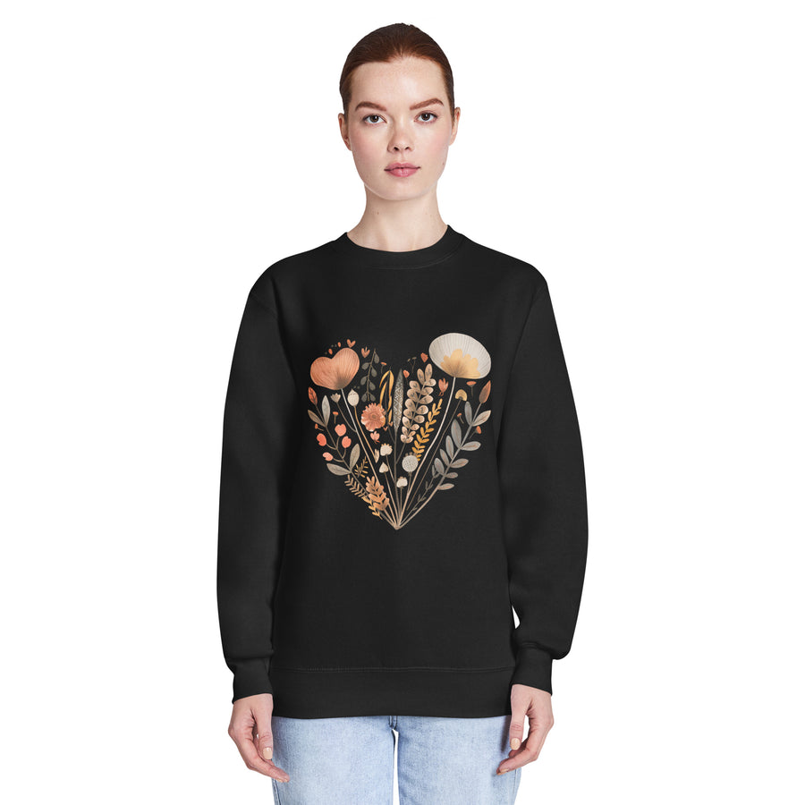 Person wearing a black sweatshirt with a floral heart design on a white background