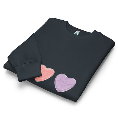 Black sweatshirt with pink and purple hearts on a white background