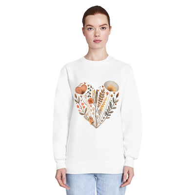 Person wearing a white sweatshirt with a floral and leaf design on a white background