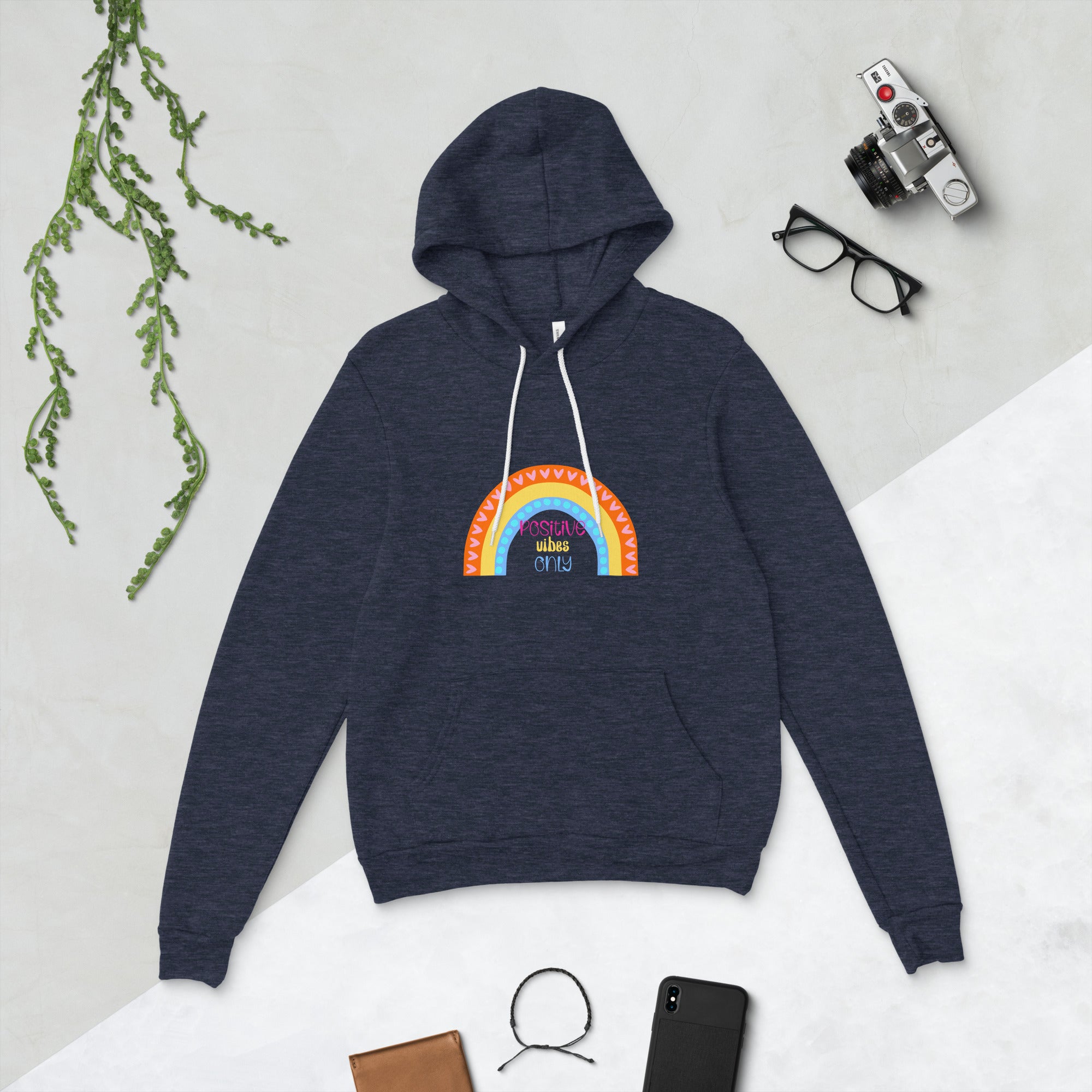 Navy blue hoodie with a colourful rainbow design on a light grey background