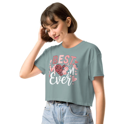 Woman wearing a green t-shirt with with 'Best Mum Ever' text and hearts on a white background