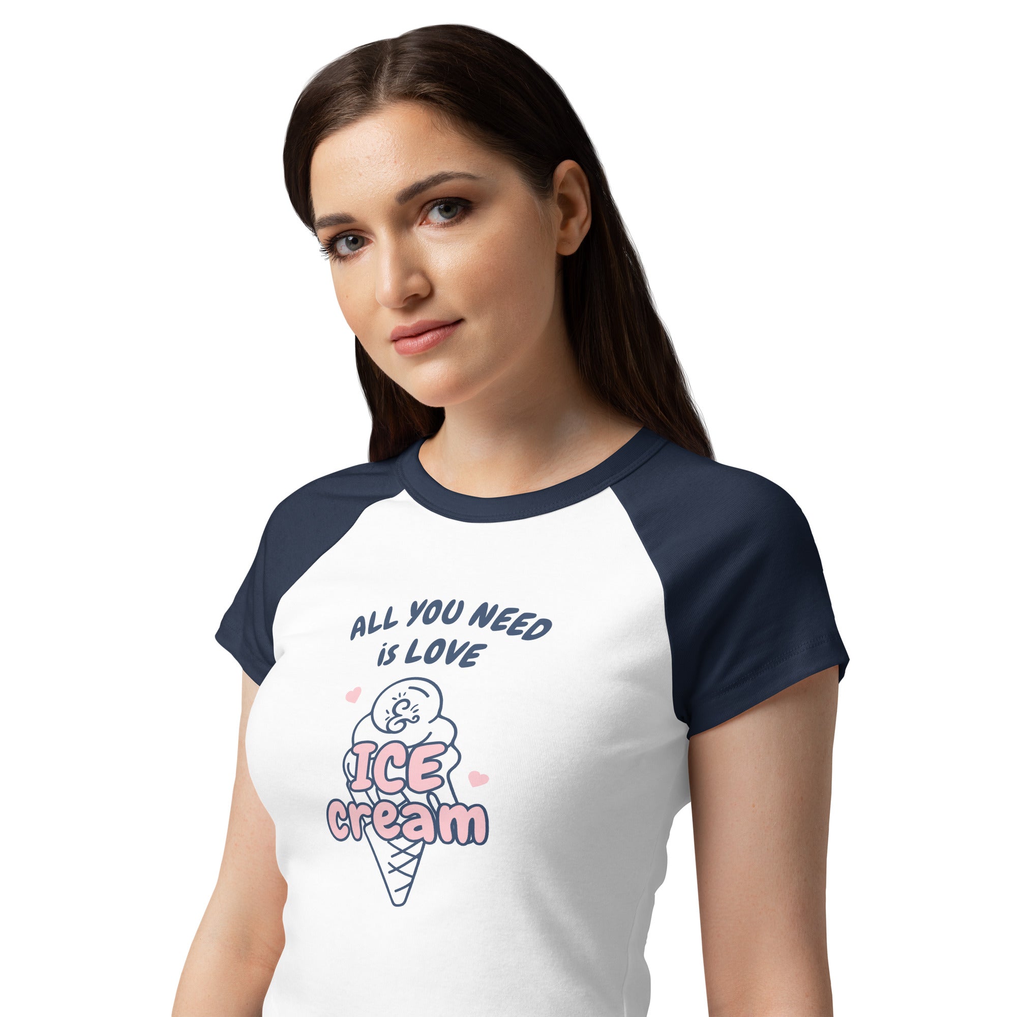 Woman wearing a white and navy blue t-shirt with an ice cream cone graphic and text.