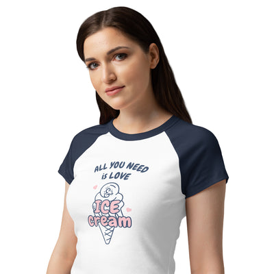 Woman wearing a white and navy blue t-shirt with an ice cream cone graphic and text.