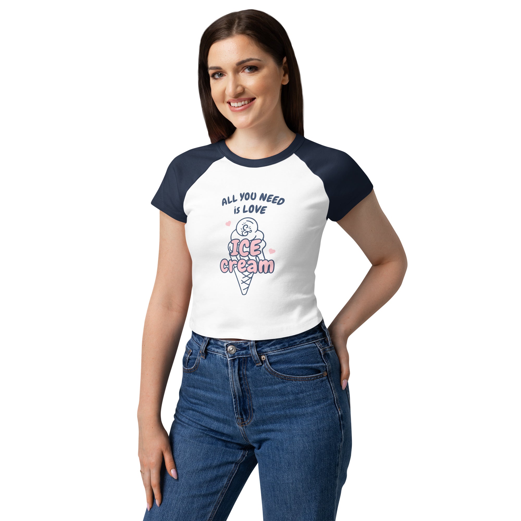 Woman wearing a white and navy blue t-shirt with ice cream cone graphic and text.