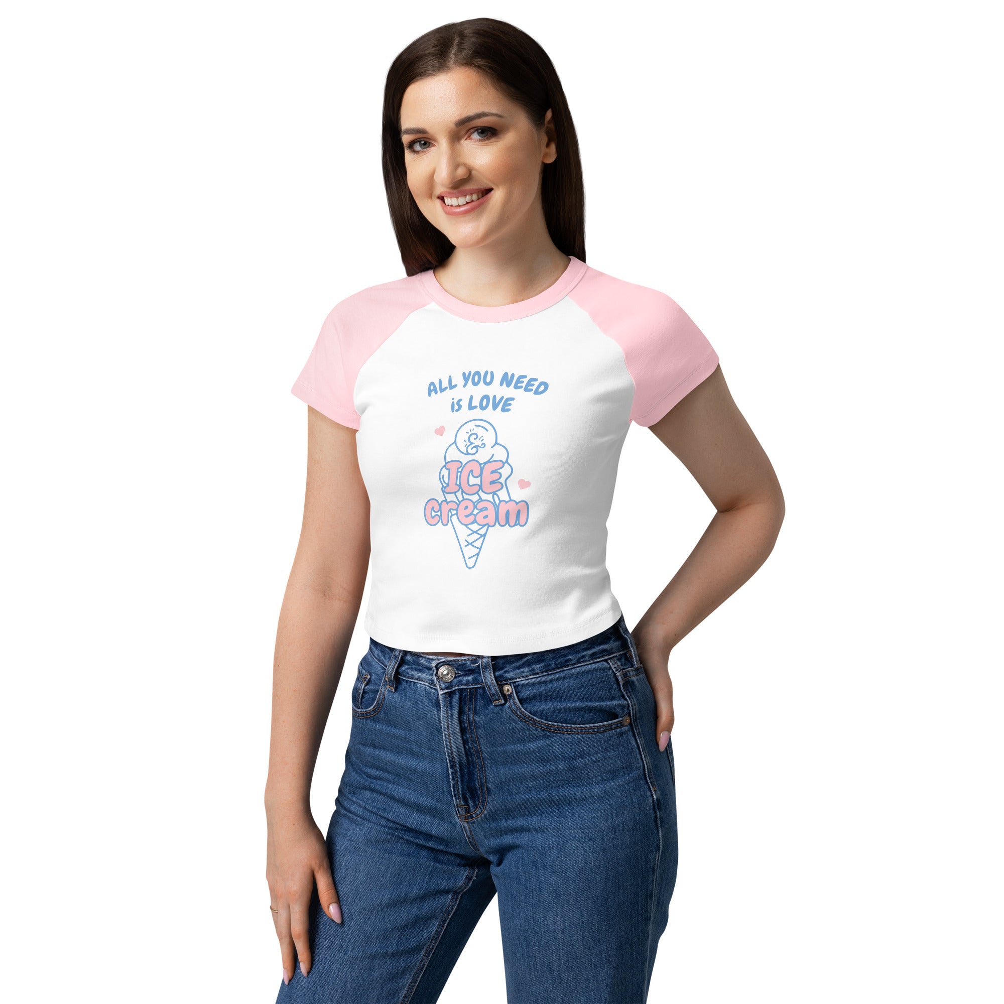 Woman wearing a white t-shirt with pink sleeves and ice cream-themed text on a white background
