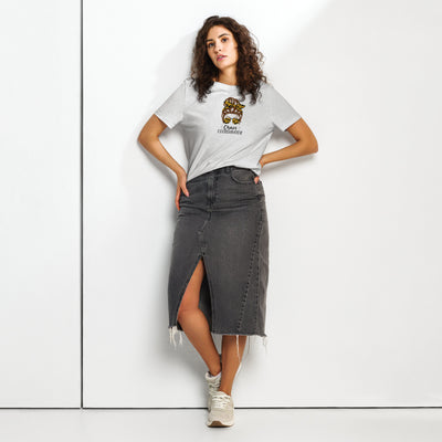 Woman wearing a white t-shirt with a logo and 'Chaos Co-ordinator' text and a black denim skirt on a white background